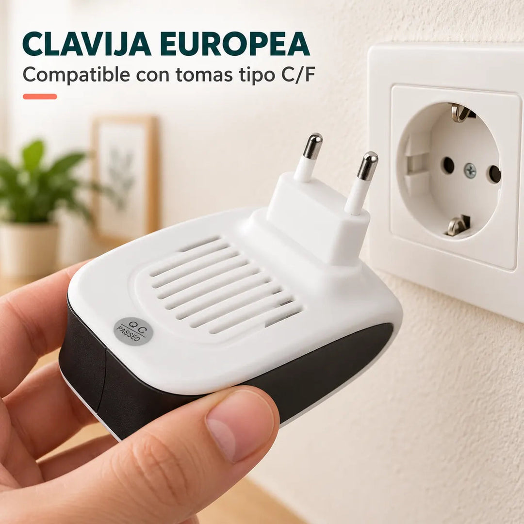 Clavija europea del aparato junto a un enchufe de pared español